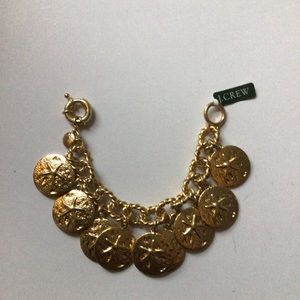 Vintage J.Crew Sand Dollar charm bracelet with signature spring ring closure.